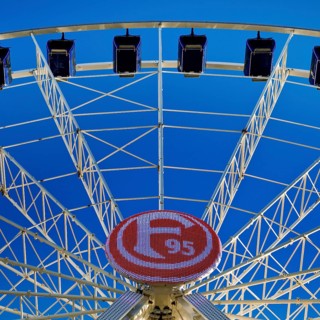 Logo in club colours of Fortuna Düsseldorf on the Ferris wheel, Burgplatz, Düsseldorf, North