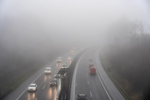 Dense fog, with visibility sometimes less than 100 metres, A52 motorway, in Essen, North