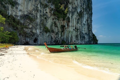 Long-tail boat on the beach of Koh Lao Liang Island, Thailand