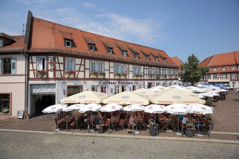 Street restaurant Cafe Ristorante with parasols, view from above, people, Freihofsplatz,