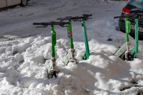 Parked, snow-covered scooters, Nuremberg, Middle Franconia, Bavaria, Germany