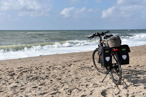 Bicycle, e-bike on the Danish North Sea, breakwater, Denmark