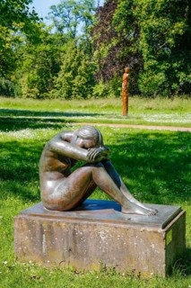 Public art, sculpture by Hermann-Christian Zimmerle sculptor, nude Eva, female figure, bronze