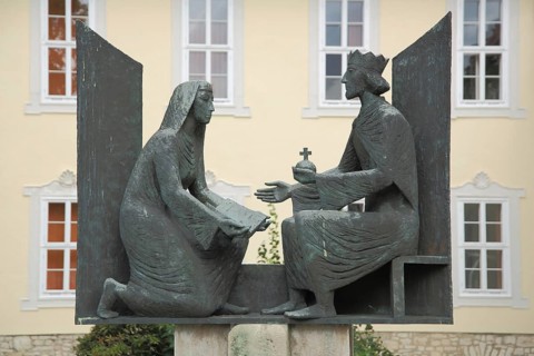 Memorial to medieval poet and abbess Roswitha of Gandersheim with Emperor Otto I, 1978, bronze