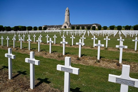 Cemetery of soldiers killed in the First World War, in the background the ossuary of Douaumont,
