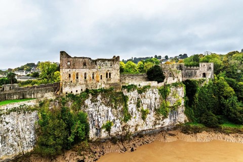 Autumn over Chepstow Castle and River Wye from a drone, Chepstow, Monmouthshire, Wales, UK