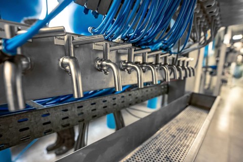 Several stainless steel systems with blue cables in a technical environment, ENCW Netze Calw