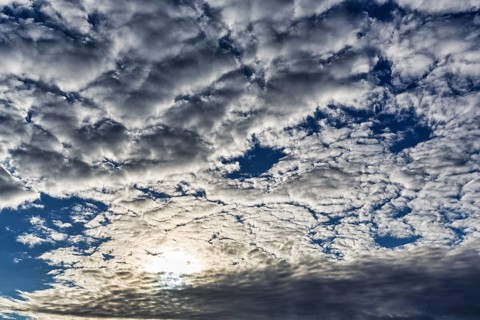 Cumulus clouds, cloudy sky, sun behind cloud cover, full-frame, Rosslare, Wexford, Ireland