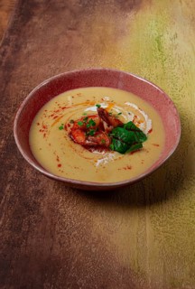 Pumpkin cream soup with shrimp, herbs and spices, homemade, no people