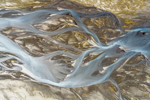 Aerial view of stream flowing around sandbanks, river Rio Ibanez short before flowing into lake