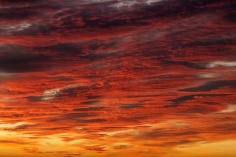 Orange-red coloured cloudy sky after sunset, cloud formation, evening sky, sunset,