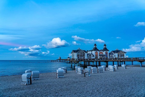 The pier of Sellin, evening mood, sunset, 394 metres long, with restaurant, jetty, beach chairs,