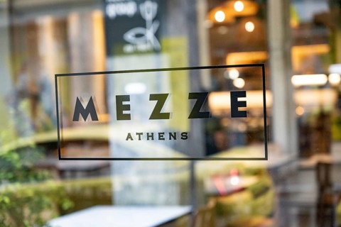 Athens, Greece. April 24th 2025. Entrance sign and logo for the popular Mezze Restaurant, a modern