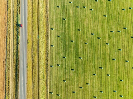 Meadow full of colored hay bales, aerial view, southern coast, Iceland