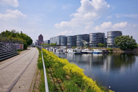 Five Boats office building by architect Sir Nicholas Grimshaw & Partners and the marina on