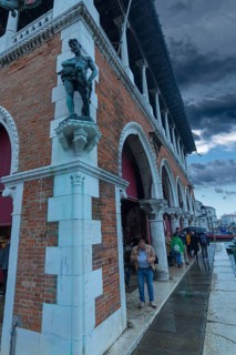 Peter the Fisherman sculpture at the fish market building, Rialto Market, Venice, Veneto, Italy