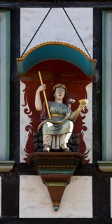 Hygieia, figurative façade decoration, patron saint of pharmacists, Raths-Apotheke Goslar, one of