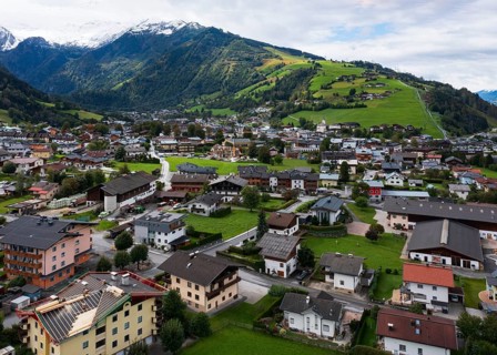 Drone image, residential buildings, view of village with parish church, Kaprun, Pinzgau, Salzburg