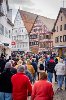 Demonstration with many people in front of historic city architecture, Against the Right Demo,