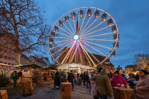 Winter village with Ferris wheel, Christmas market at Jakobsplatz, Nuremberg, Middle Franconia,