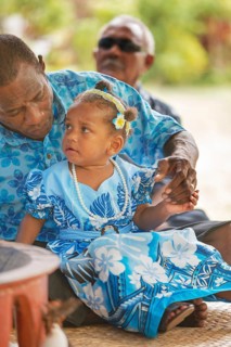 Family at village ceremony, Yasawa islands, Fiji