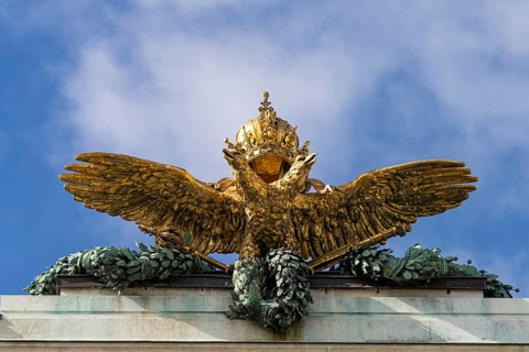Double-headed eagle with imperial crown on the cornice of the Neue Burg in Vienna, Austria