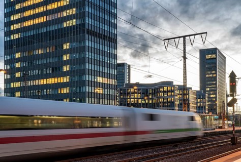 Railway station, ICE train on platform, skyline of Essen city centre, North Rhine-Westphalia,