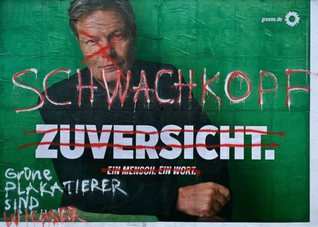 Denigration of a large poster for the 2025 federal election by the Greens with Robert Habeck,