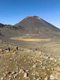 On the hiking trail of the Tongariro Alpine Crossing in Tongariro National Park with a view of the