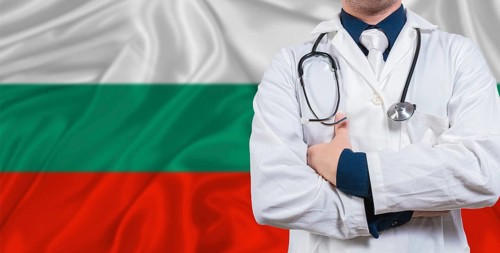 Male doctor with stethoscope on Bulgarian flag. Doctor holding stethoscope on Bulgarian flag