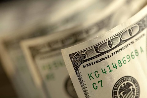 Abstract of one hundred dollar bills with narrow depth of field