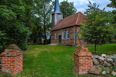 Picturesque view of Zachow village church, a 17th century half-timbered church in Zachow, Groß