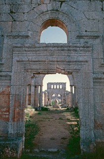 In front the north basilica, column, behind the south basilica with entrance, Monastery of St