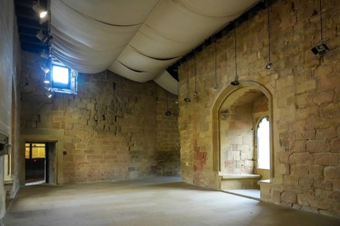 Interior view of the medieval royal palace of olite, navarre, spain, showing restored stone walls