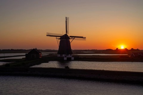 1878 windmill Het Noorden, traditional polder mill, smock mill near Oosterend on the island Texel