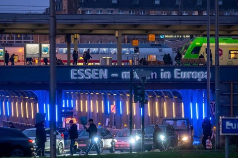 The main train station in Essen, blue-lit underpass, bus station, am Europaplatz, public transport