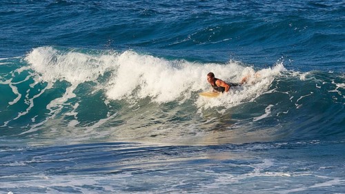 Surfer in motion on small sea wave, wave surfer, surfer, surf, waves, west coast, Arkasa,