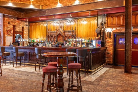 Traditionally furnished bar with a wooden counter and cosy atmosphere, Liverpool