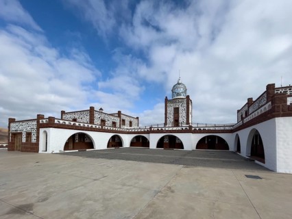 View of inner courtyard of building complex of lighthouse Faro de la Entallada from 50s year 1953