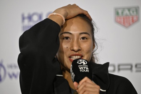 Qinwen Zheng (CHN) portrait, smiles, microphone, mike, logo, WTA, press conference, press