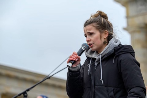 Luisa Neubauer speaks at the Fridays for Future climate strike. Brandenburg Tor, Berlin, 14