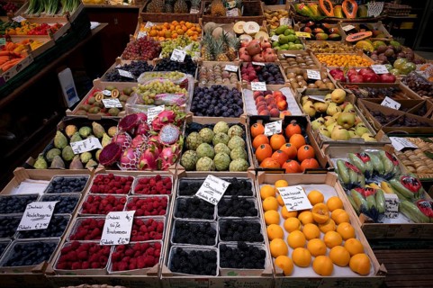 Interior view market hall, fruit stall, fruit, tropical fruit, pitahaya, prickly pears, food