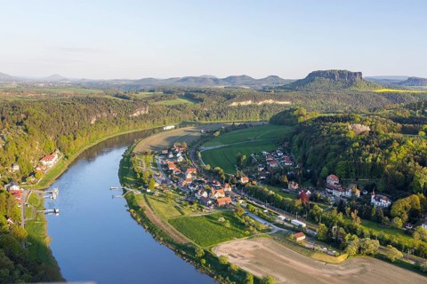 View from the Basteiaussicht into the Elbe valley towards Rathen and the Elbe, in the background
