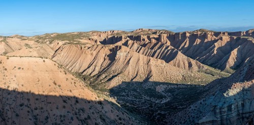 Wide hilly desert landscape with dry vegetation, Gorafe desert, semi-desert, Granada, Andalusia,