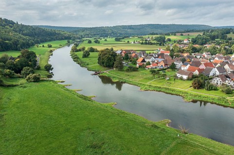 Aerial view of village Wahmbeck and the Weser river, traditional ferry, Weserbergland, Germany