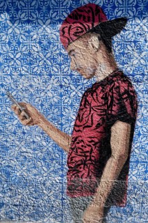 Mural of a young man with a mobile phone, graffito, Al Khobar, ash-Sharqiyya province, Persian
