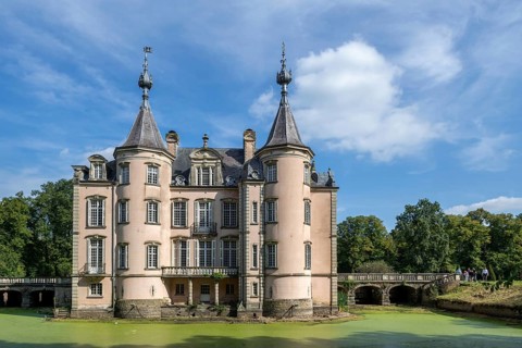 1750 moated Poeke Castle, Kasteel van Poeke in Rococo style near Aalter, East Flanders, Belgium