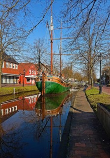 Open-air shipping museum on the main canal with the museum ship Kuff Margaretha von Papenburg,