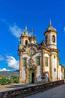 Baroque cathedral in the historic city of Ouro Preto illuminated by the sun, Ouro Preto, Minas