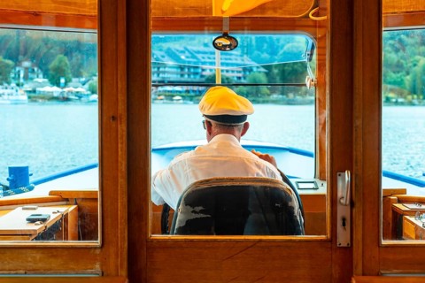Captain of a pleasure boat in summer on Lake Titisee in the Black Forest, Germany
